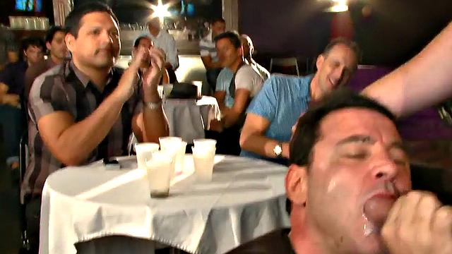 Public DILF sucks cock in strip club in front of viewers