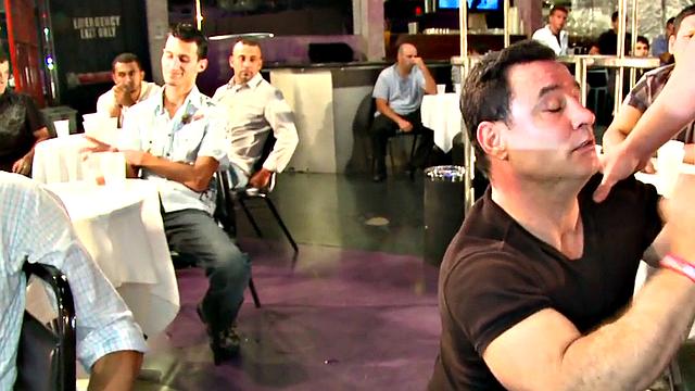 Public DILF sucks cock in strip club in front of viewers