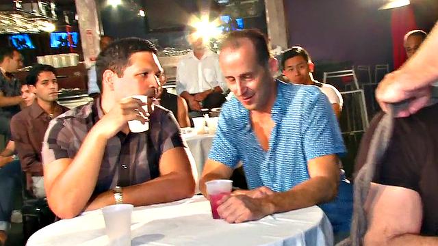 Public DILF sucks cock in strip club in front of viewers