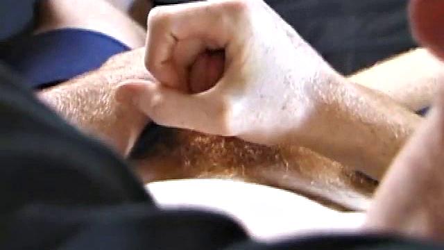 Tristan Stroking Cock