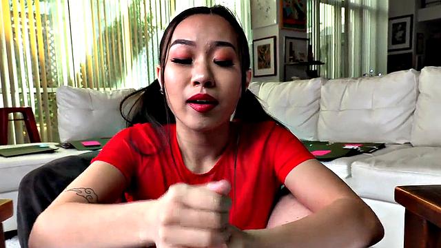 Asian babe jerks POV cock while talking dirty