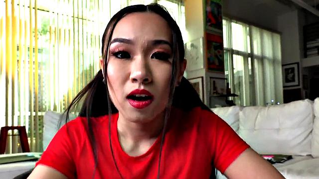 Asian babe jerks POV cock while talking dirty