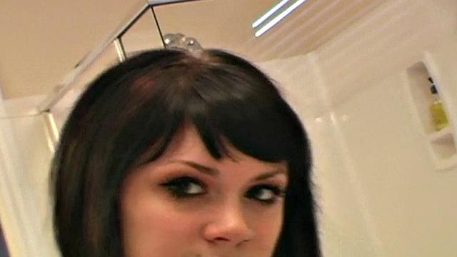 Pretty teen does her makeup