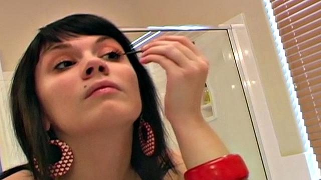 Pretty teen does her makeup
