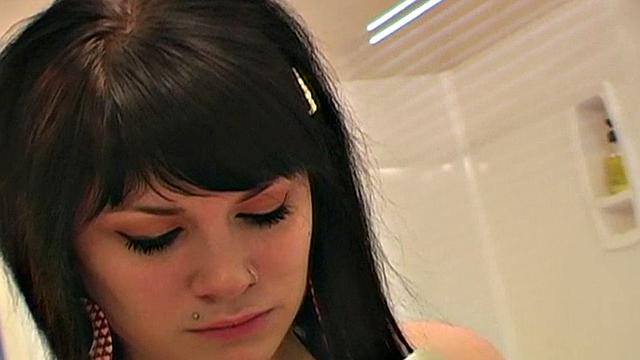 Pretty teen does her makeup