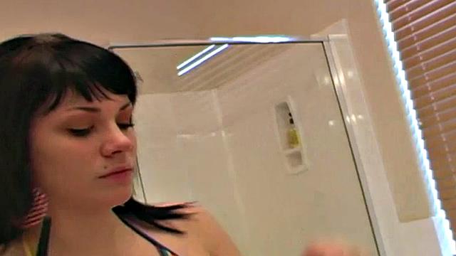 Pretty teen does her makeup