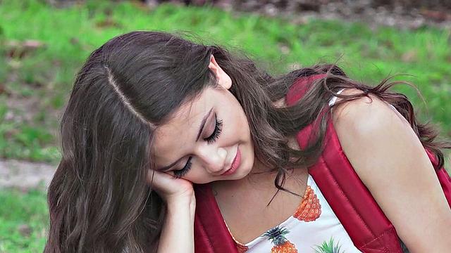 A cute brunette teen grind on a hard cock in a car