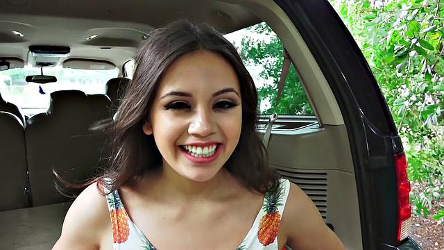 A cute brunette teen grind on a hard cock in a car