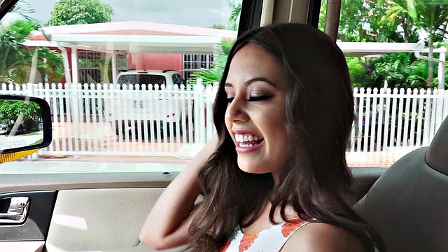 A cute brunette teen grind on a hard cock in a car