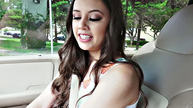 A cute brunette teen grind on a hard cock in a car