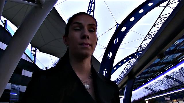 Brunette's mouth filled with cum after a steamy photoshoot with big tits and sexy earrings