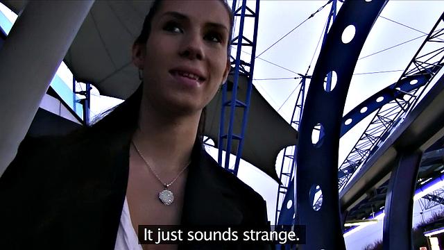 Brunette's mouth filled with cum after a steamy photoshoot with big tits and sexy earrings