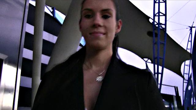 Brunette's mouth filled with cum after a steamy photoshoot with big tits and sexy earrings