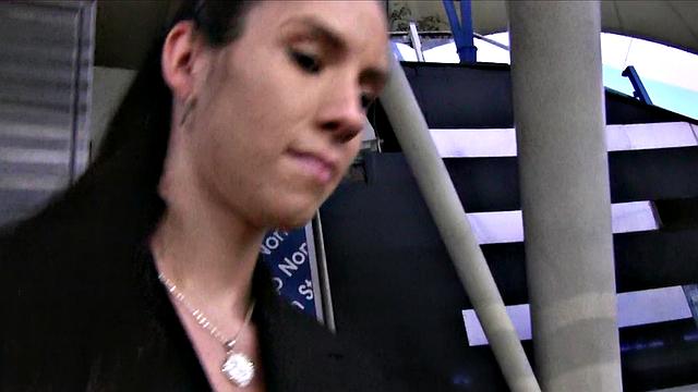 Brunette's mouth filled with cum after a steamy photoshoot with big tits and sexy earrings