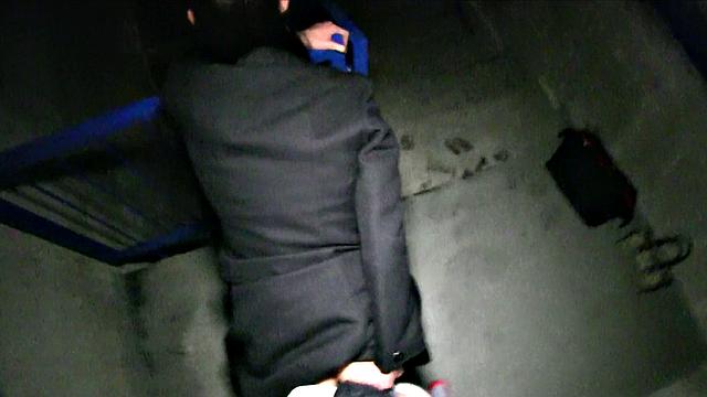 Brunette's mouth filled with cum after a steamy photoshoot with big tits and sexy earrings