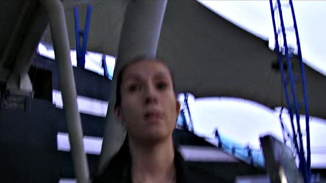 Brunette's mouth filled with cum after a steamy photoshoot with big tits and sexy earrings