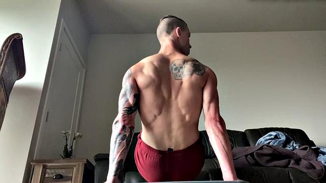 Ripped jock masturbates and plays with big dildo solo