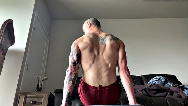 Ripped jock masturbates and plays with big dildo solo