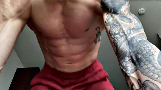 Ripped jock masturbates and plays with big dildo solo