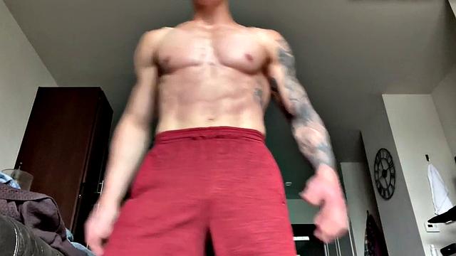 Ripped jock masturbates and plays with big dildo solo