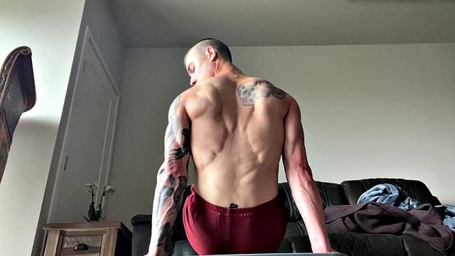 Ripped jock masturbates and plays with big dildo solo