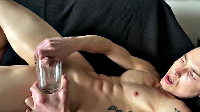 Ripped jock masturbates and plays with big dildo solo