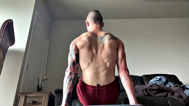 Ripped jock masturbates and plays with big dildo solo