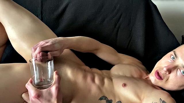 Ripped jock masturbates and plays with big dildo solo