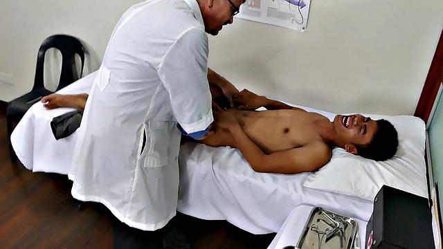 Asian twink barebacked by white doctor after check