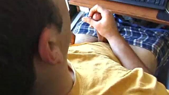 Young Tony returns for another solo session and after pulling off his pants he strokes up a stiff one, while watching some on his computer. After jacking off with determination, Tony strokes out another messy cum shot