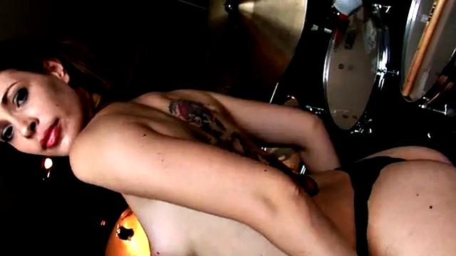 Lesbian Nina Drummer showcasing tits and pussy