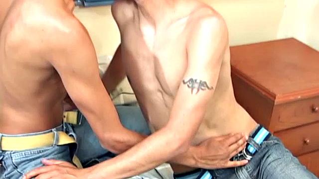 Latin twinks Ferdynan and Eduardo are on the bed kissing and stripping each other naked. Before the pants come off, Eduardo goes down on his top and quickly sucks his uncut cock stiff.
