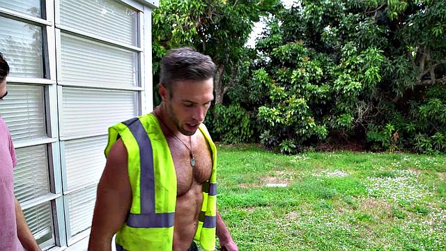 Watch this horny BWC hunk pound a nympho stud's ass in the living room