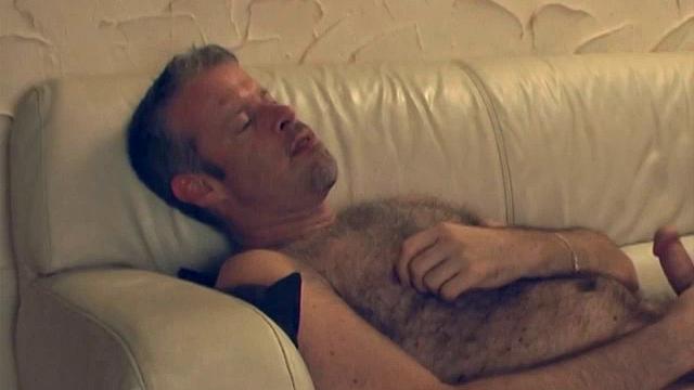 When Victor walks into the room, Rusty is already preparing his cock for Victor's hot mouth. Victor stands back a moment and then moves in to get a big wet taste of Rusty's fat cock and hairy chest.