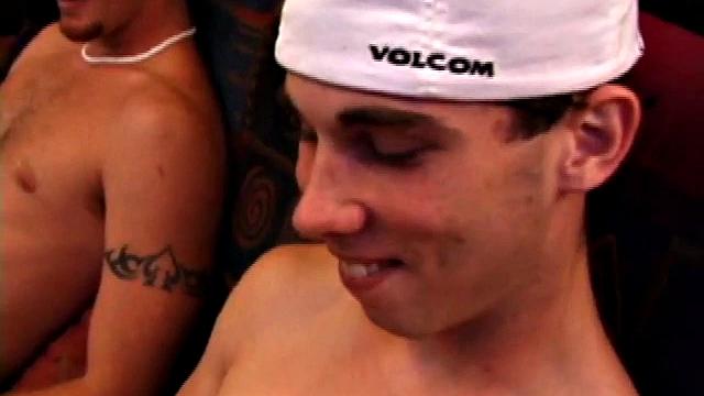 Lic seems very much at ease with Tapher. Both guys are in jeans and t-shirts, but lose them as they settle into each other. First, Lic slides his hand down his pants to work up a stiff one, while Tapher rubs one up from the outside.