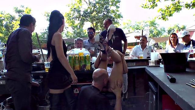 Public bdsm sub cocksucking and rimming in front of voyeurs