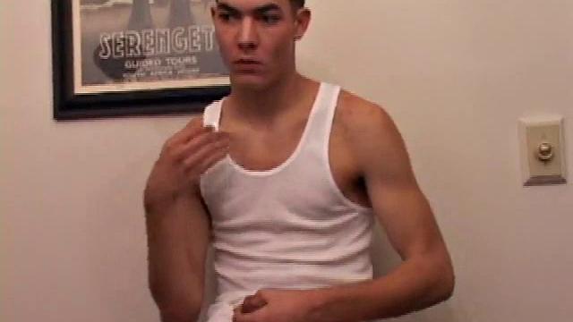 Brennan Stark gets a porn video going, as he tells us how he's going to eat his load. He pulls his pants off and strokes his hard cock, until he blasts a nut onto a nearby clipboard. Then he licks the cum clean.