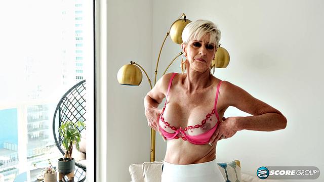 Meet Foxxxy, a 60-year-old wife with big tits and a pierced clit