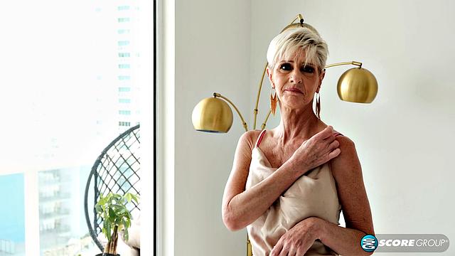 Meet Foxxxy, a 60-year-old wife with big tits and a pierced clit