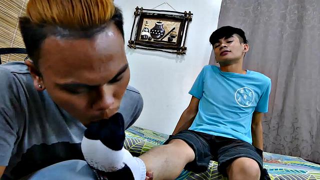 After watching Felix's male feet video, Mikal enjoys foot worship on his Asian twink feet. Mikal is pretty cute and hot himself.