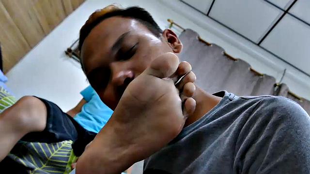 After watching Felix's male feet video, Mikal enjoys foot worship on his Asian twink feet. Mikal is pretty cute and hot himself.