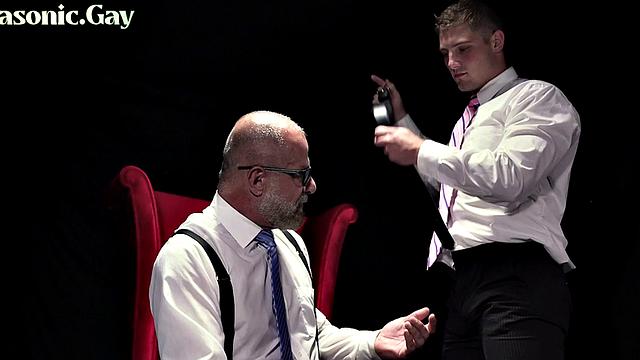 Cult leader spanking a straight guy during apprenticeship