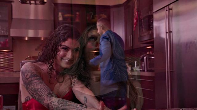 Brunette hottie with curly hair takes on two guys in a steamy threesome