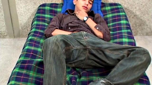 Brad is flat on his back, ready to beat his meat. Clothes start stripping off as skinny twink pulls out a big stiff cock from the leg of his underwear.