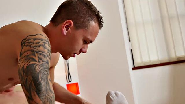 Mickey and Andrew are at home getting hot and horny. It's not long before the guys undress and Andrew slips off Mickey's white socks, sucking his big toes. Andrew then gets Mickey hard and sucks his cock.