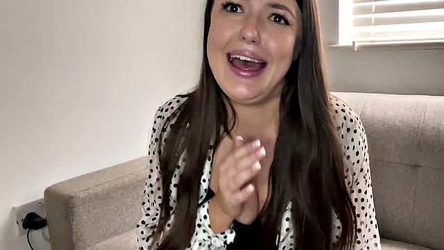 Watch this curvy young brunette talk dirty about tiny dicks on the phone