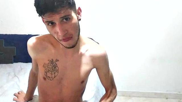 In his bedroom, this skinny Latin boy quickly strips out of his boxer briefs and works up a stiff one. He is all over the place, while showing us his little butt and beating off.