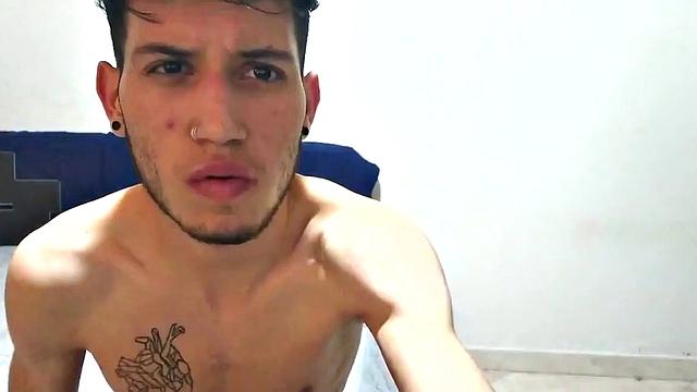 In his bedroom, this skinny Latin boy quickly strips out of his boxer briefs and works up a stiff one. He is all over the place, while showing us his little butt and beating off.