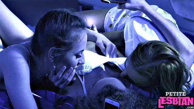 Petite lesbian babe banged by dildo