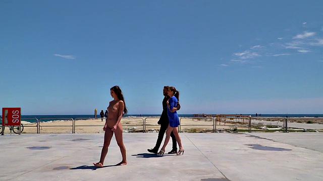 Public euro walks and crawls outdoors in front of strangers